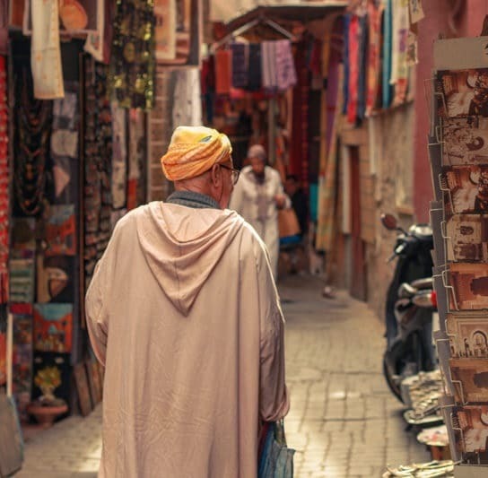 man walking in the medina streets of marrakech